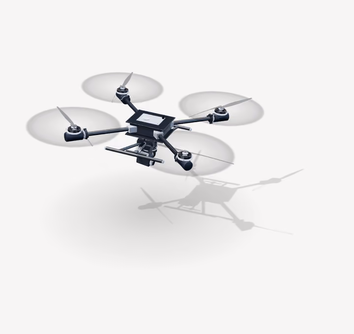 The inspection drone in flight, its gear folded up, the gimbal aimed down.